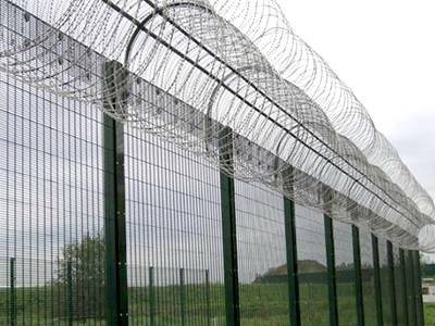 358 security fence with concertina razor wire topping fear away intruders.
