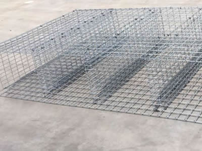 This is a welded wire mink cage with one floor.