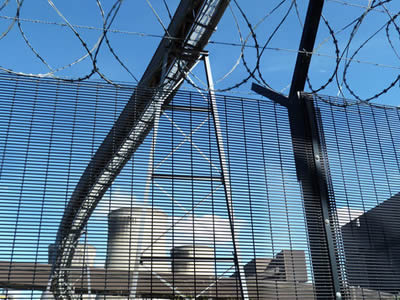 This is welded wire 358 fence with concertina razor wire in thermal power station.