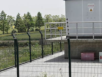 This is a wind power station with single welded wire fence.