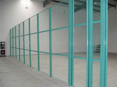 This is a corner of factory with welded wire partition panels.