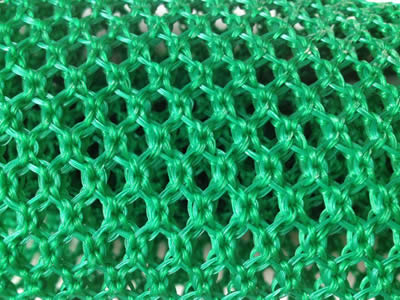 This is a roll of green windbreak netting.